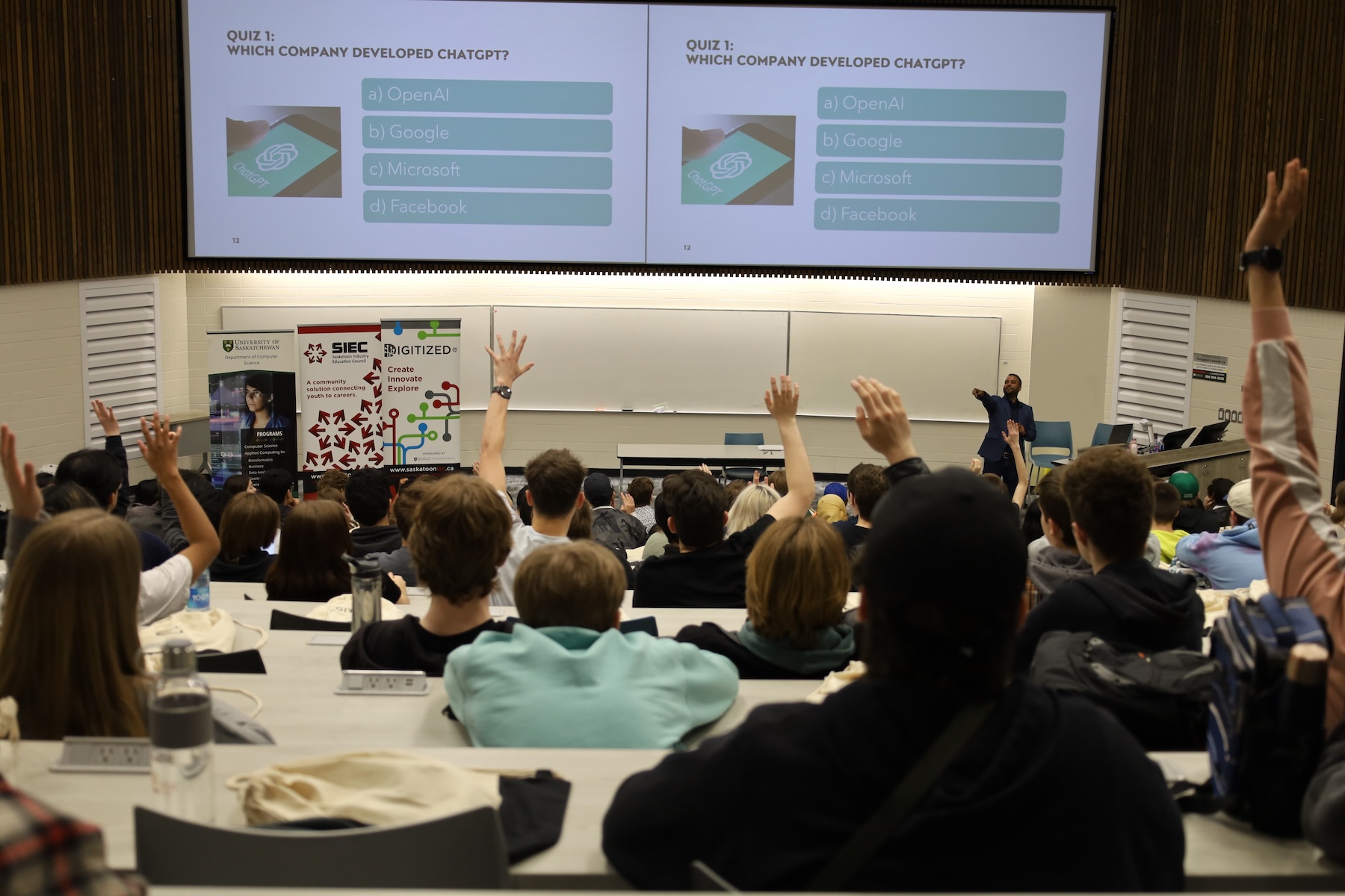 High school students watch the event keynote